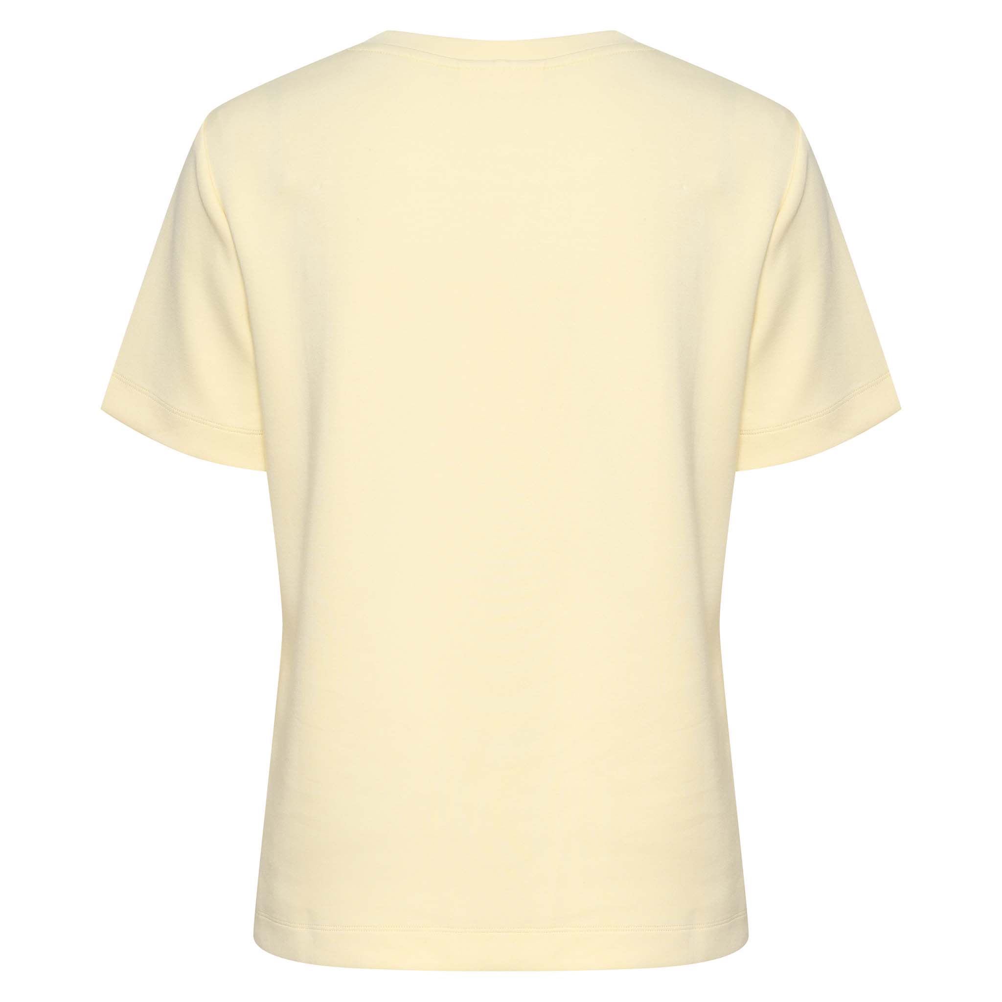 In Wear, vaaleankeltainen, siistimpi t-paita. Takakuva.