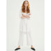 In Wear, naisten leveälahkeiset valkoiset vajaamittaiset culotte-housut. Etukuva mallin päällä.