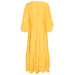 In Wear, kirkkaan keltainen, pitkä mekko. Frillat hihoissa ja helmassa. Takakuva.