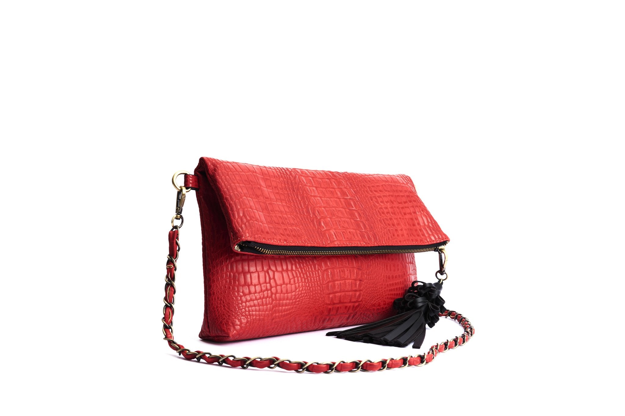 Krokotiilikuvioinen, punainen clutch-laukku Lola Ramonalta, malli Joy Red Crocodile. Mukana olkahihna.